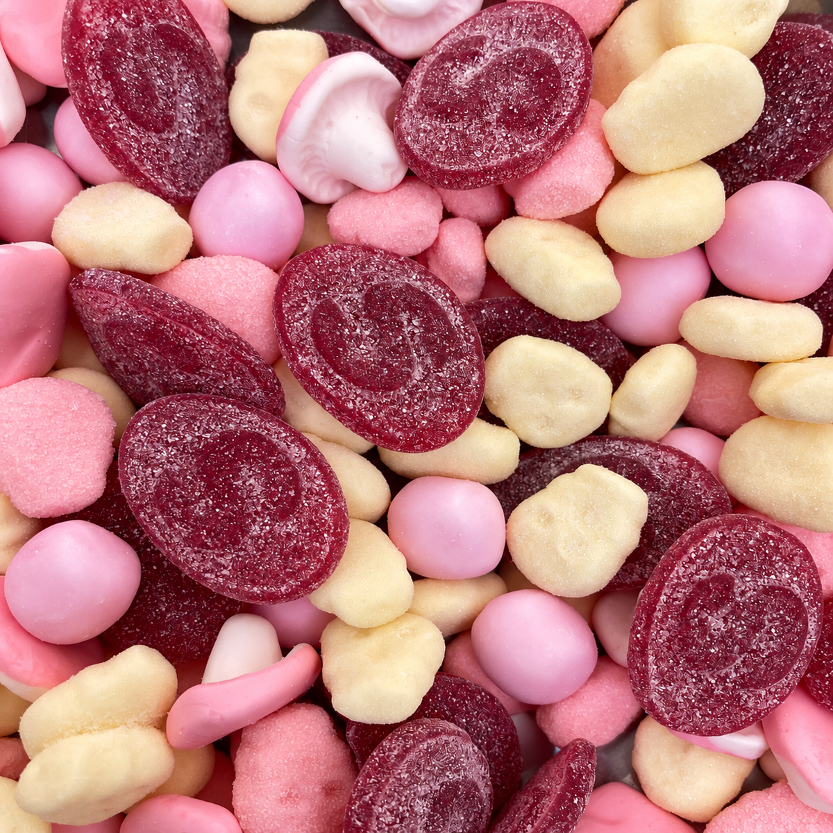 Berry Blush Swedish candy mix close-up with pink cream and cherry candies