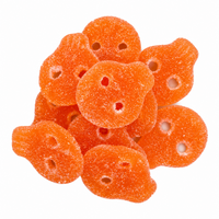 Mango Skulls sugar coated orange gummy candies on white